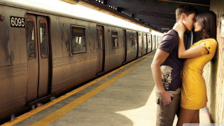 Man woman kissing train station 3 - a station free wallpaper