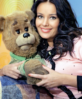 Woman holding teddy bear smiling - free animals wallpaper for mobile