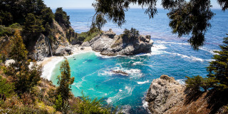 Beach blue water trees rocks 2 - allan brooks free wallpaper