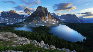 Mountain lake snowy horizon nature - a lake in the foreground and a mountain range in the background free wallpaper