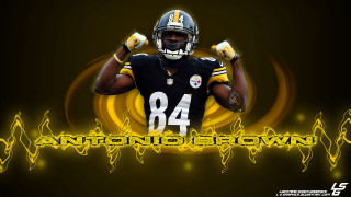 Football player hands in air - a football player free wallpaper