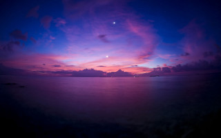 Purple blue sky moon clouds - a moon in the distance free wallpaper