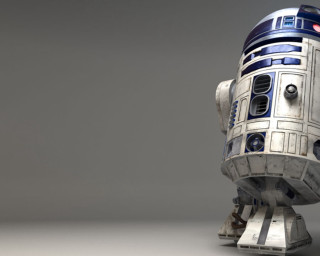 Robot standing table gray background 2 - a gray background behind free wallpaper