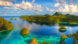 Blue lagoon mountains boat sky - blue water free wallpaper