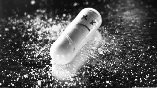 Smiley pill rain water droplets - a smiley face free wallpaper