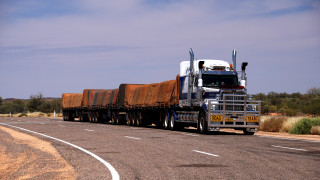 Truck trailer driving road brown - heavy free wallpaper