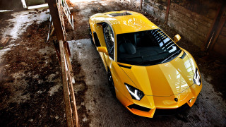 Yellow sports car garage roof - car free wallpaper