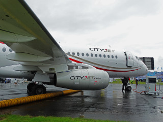 Jetliner airport tarmac yellow hose - side profile free wallpaper