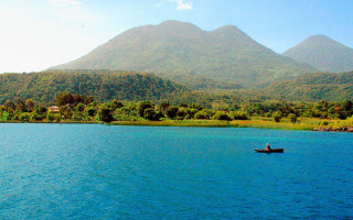 Man boat lake mountains blue - a man in a boat free wallpaper