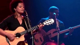 Woman playing guitar singing microphone - a woman playing free wallpaper