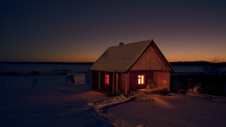 Small cabin lit door snow - a small cabin free wallpaper