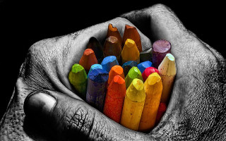 Person holding colored crayons hands - crayon art free wallpaper