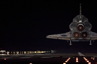 Space shuttle takeoff night airport - a space shuttle free wallpaper