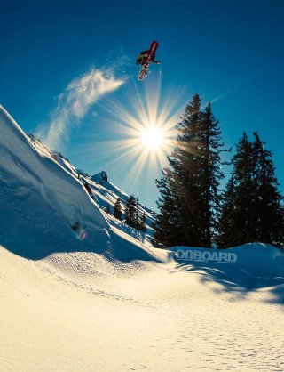 Snowboard jump sunshine hill trees - free winter wallpaper for mobile