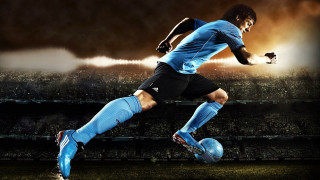 Soccer player kicking ball stadium 5 - alain tasso free wallpaper