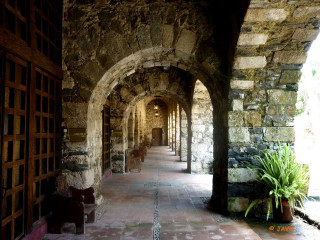 Stone building hallway doors bench - a long hallway free wallpaper