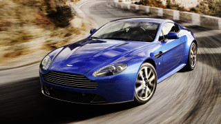 Blue sports car driving mountains - a.d.m. cooper free wallpaper