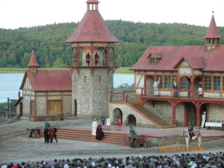 Castle clocktower group people standing - roof free wallpaper