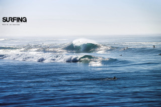 Surfing group wave ocean sky - in the ocean free wallpaper