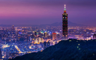 City skyline night tall tower - a purple sky above free wallpaper for desktop