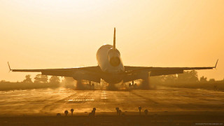 Jetliner airport runway sunset people - top of an airport runway free wallpaper