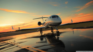 Small plane parked runway sunset - the tarmac free wallpaper
