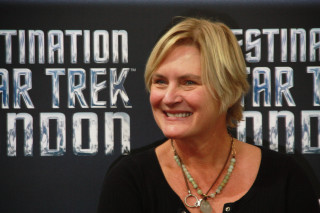 Woman smiling star trek sign - carol sutton free wallpaper