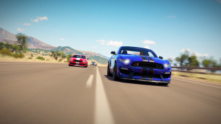 Cars driving road mountains blue - two car free wallpaper