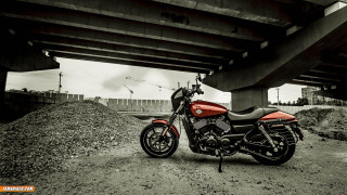 Red motorcycle under bridge dirt - a red motorcycle free wallpaper