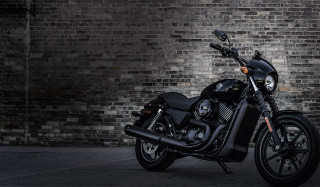Black motorcycle brick wall parking - a black helmet free wallpaper