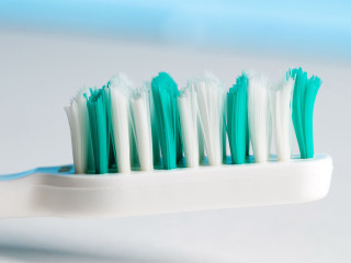 Toothbrush toothpaste tabletop blue white - a table top free wallpaper
