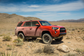 Red toyota truck desert mountains - a desert landscape free wallpaper