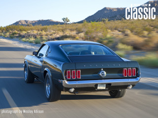 Black mustang driving road mountain - cleve gray free wallpaper