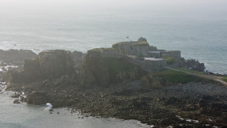 Castle rocky cliff ocean shore - a large castle free wallpaper
