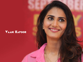 Woman smiling red background black - a red wall behind her free wallpaper