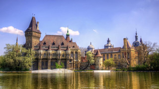 Large building tower clock water 11 - a tower and a clock free wallpaper