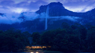 Waterfall night mountains lake boat - stunning free wallpaper
