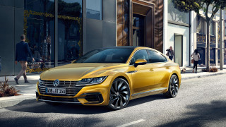 Yellow volkswagen arteus parked street - private free wallpaper