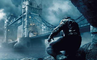 Man leather jacket bridge knife - dark shadow free wallpaper