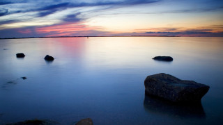 Water rocks sunset clouds sky - tranquil free wallpaper
