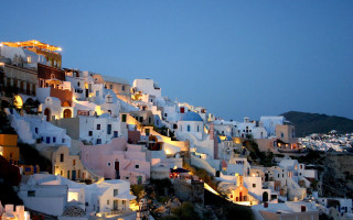 Hillside white buildings nighttime lights - a hillside free wallpaper