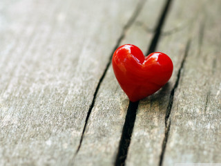 Heart shaped object wooden surface - the surface free wallpaper