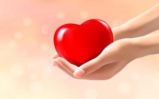 Person holding red heart blurry - soft free wallpaper