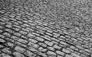 Cobblestone street black white stop - a stop sign free wallpaper