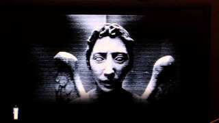 Creepy television face hands behind - footage free wallpaper