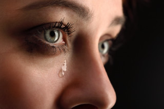 Teary eye closeup woman emotion - emotional free wallpaper