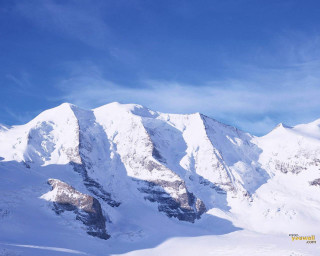 Person skis snow mountain range - minimalism free wallpaper for desktop
