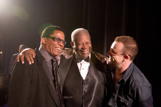 Three men suits smiling glasses - one man free wallpaper