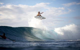 Man surfboard jumping wave ocean - evan charlton free wallpaper