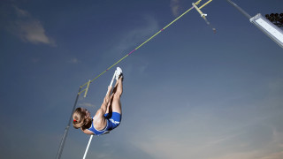 Woman blue bikini high jump - a pole free wallpaper
